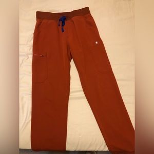 FIGS limited edition Auburn skinny scrub pants size small.